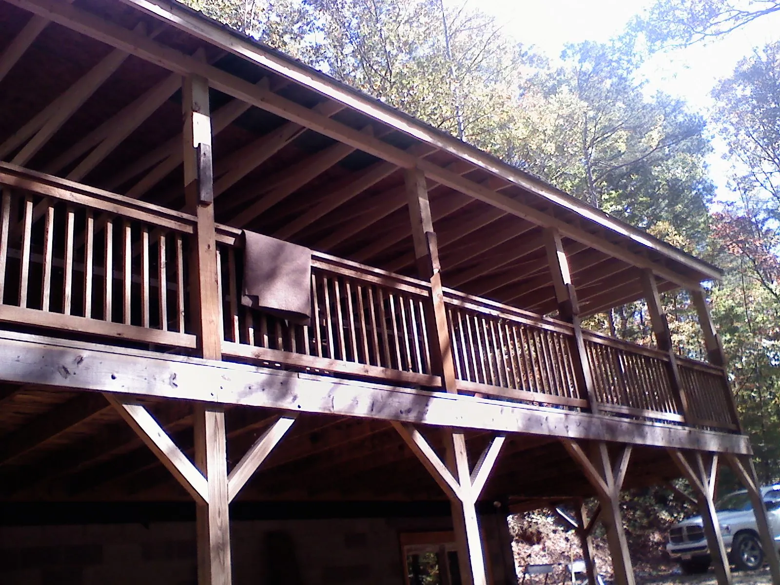 Timber framing under a new elevated porch and deck — Roof Leak Repair in Winamac by Roofing Brothers